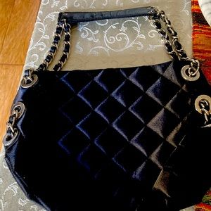 Used super cute black quilted handbag.